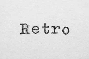 Retro word on white paper printed with typewriter