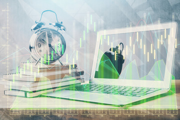 Multi exposure of graph and financial info and work space with computer background. Concept of...