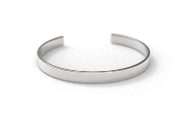 Metal silver coloured bracelet on white background, the product mock-up - obrazy, fototapety, plakaty