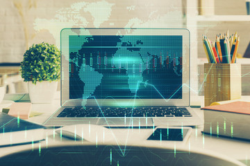 Multi exposure of graph and financial info and work space with computer background. Concept of...