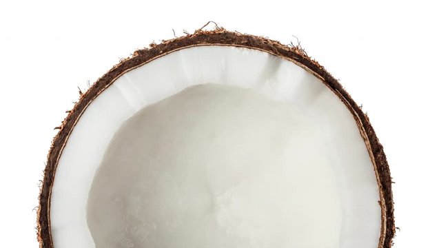 panning Coconut Half isolated on white background. Top view.