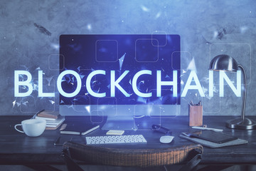 Obraz premium Double exposure of blockchain and crypto economy theme hologram and table with computer background. Concept of bitcoin cryptocurrency.