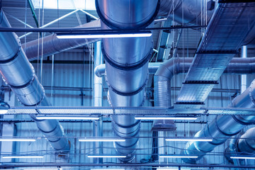 Air conditioning of buildings. Background of ventilation pipes. Laying of engineering networks.