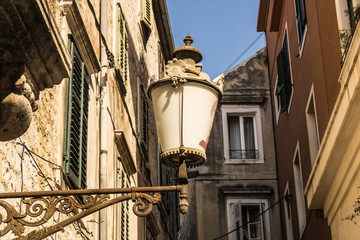 Vintage street lantern with the old houses on the background, streets of old town of Split, Croatia...