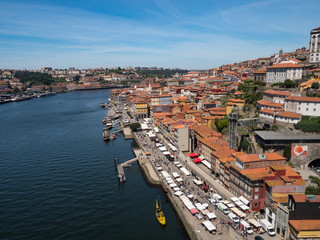 Fototapeta na wymiar Portugal. may 2019: Panoramic view of Old Porto Oporto city and Ribeira over Douro river from Vila Nova de Gaia