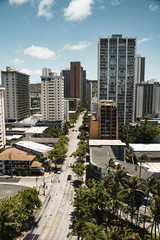 Beautiful Waikiki city views looking down Kuhio Ave on a clear, sunny day. Waikiki, Oahu, Hawaii.