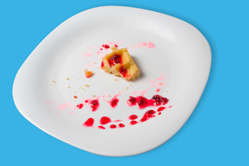 Belgian waffle with raspberry jam on a blue background. copy space