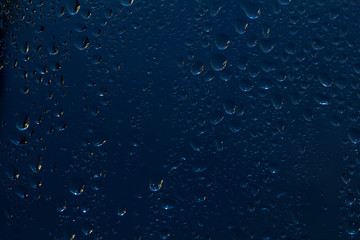 glass with drops car glass in the rain one