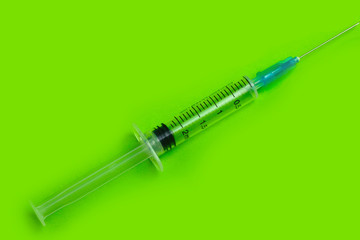 An insulin syringe with a marking, drugs on a plain background. copy space