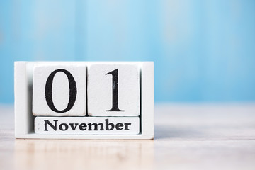 Hello November of white Calendar on wood background with copy space for text