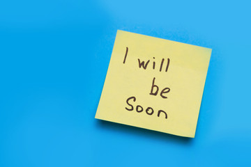 yellow sticker on a blue background. copy space