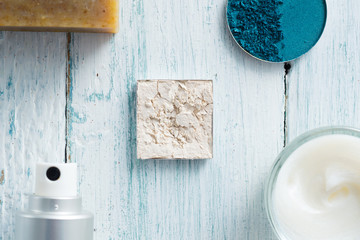 hygiene and beauty product samples, powder compact, spray, soap, moisturizer