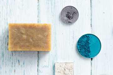 hygiene and beauty product samples, powder compact, spray, soap, moisturizer
