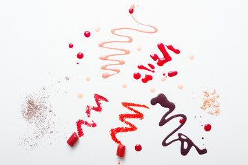 make up and beauty product samples on white