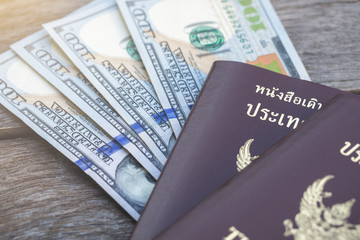 passport and banknotes for a hundred dollars visa free travel