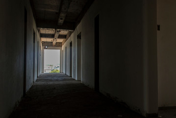 Dark corridor of abandoned building