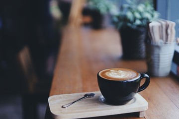cup of coffee on table in cafe