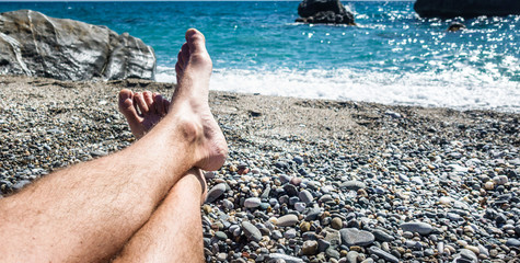 Person relaxing at beach