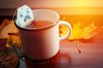 cup of coffee on the windowsill, autumn