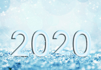 2020 happy new year card, snow and bokeh blue christmas holiday background