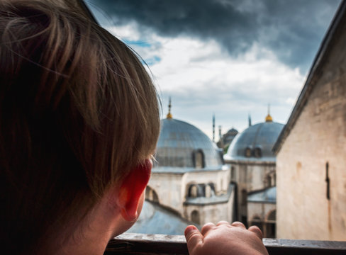 Boy admiring mosque