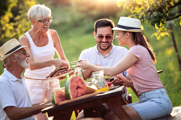 Family have lunch in park