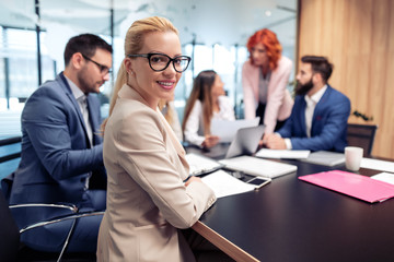 Group of business people working in office
