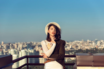 Stylish young girl in an autumn look