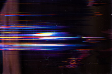 Distorted display. Technology breakdown. Flash flare on dark background.