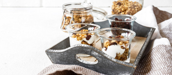 Homemade granola with milk, fresh berries, milk for breakfast. Copy space. Healthy food concept