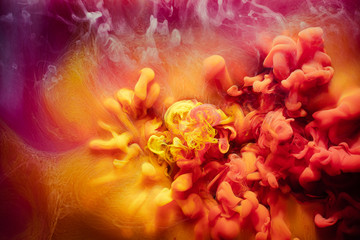 Art background. Mysterious smoke. Yellow magenta acrylic paint.