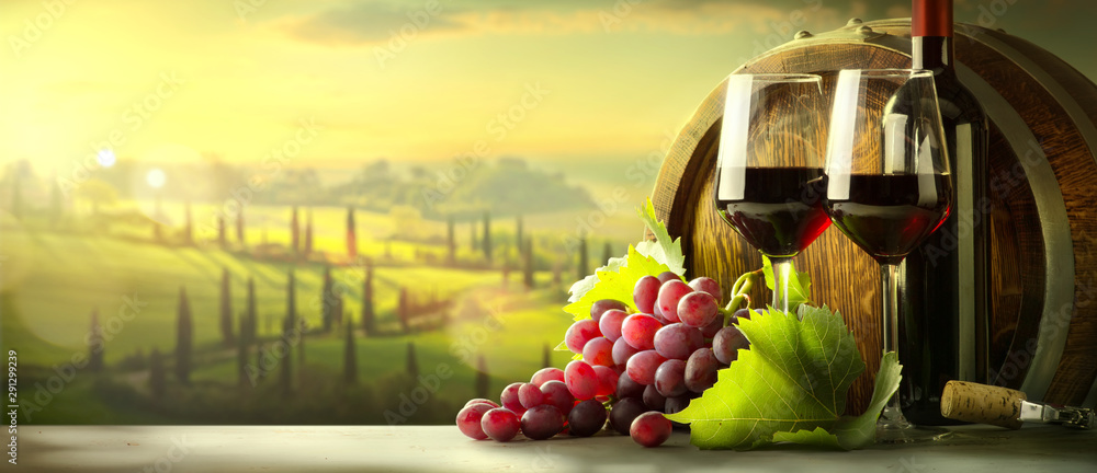 Wall mural autumn countryside wine background; vine, red wine bottles, wineglass, wine barrel; wine tasting con