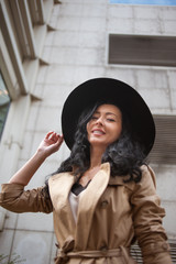 Beautiful brunette fashionable woman posing in Bucharest.