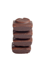 isolated stack of chocolate covered small cakes