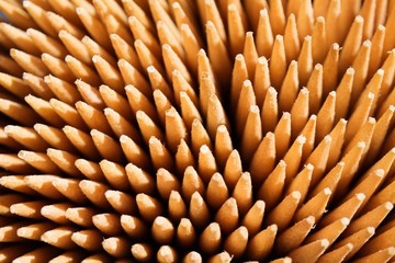 Macro close up of countless sharp wooden toothpicks