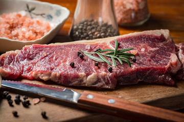 A fresh steak on the chopping board