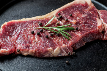 A fresh steak on the chopping board