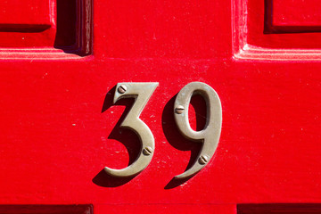 House number 39 in metal digits