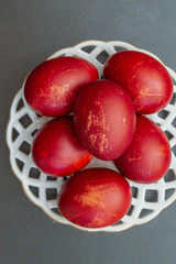 Dyed eggs in onion skins are at the plate