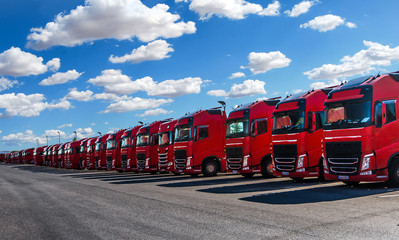 Fototapeta na wymiar german trucks in formation parking at company loft