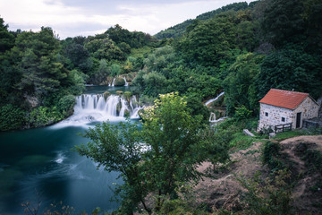 Fototapeta na wymiar The old mill by Skradinski Buk waterfall at Krka National Park, Croatia. 