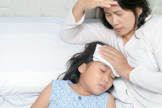 Mom Suffering From Migraine Because Her Daughter Sick