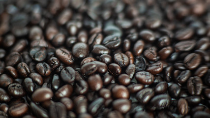 Roasted dark brown coffee bean cloe up