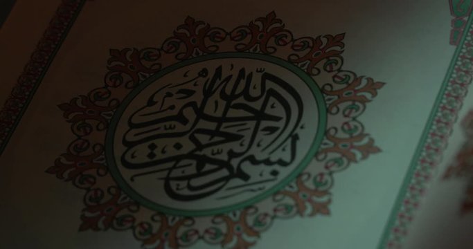 Holy Quran on Book Rest Partial Light Rotation