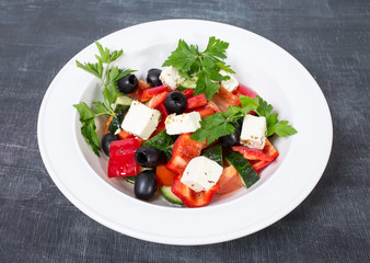 Delicious greek salad with olives.