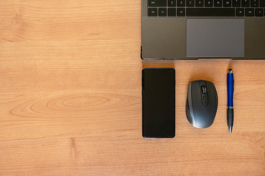Top View of Technology on Wooden Table