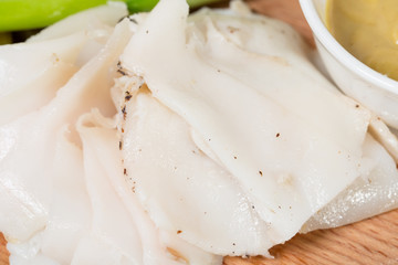 Assorted pork fat with pickles.