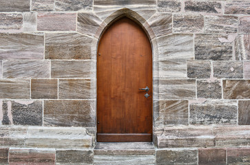 Fototapeta na wymiar Closed Wooden Door Of Old Building