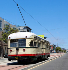 Rear view of vintage yellow and red San Francisco streetcar.