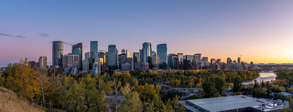 Skyline panoramic of Calgary, Alberta at sunset.